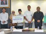 kemenag-berikan-santunan-dari-bpjs-ketenagakerjaan-untuk-ahli-waris.jpg