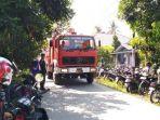 kendaraan-pemadam-kebakaran-memasuki-lokasi-jatuhnya.jpg