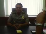kepala-bidang-humas-kepolisian-daerah-kombes-martinus-sitompul_20150309_152215.jpg