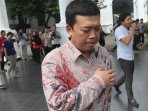 kepala-bnp2tki-dan-menteri-bumn-usai-bertemu-presiden_20150515_174417.jpg