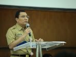 kepala-dinas-dpmptsp-provinsi-dki-jakarta-edy-junaedi_20170928_132818.jpg