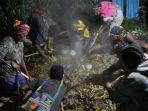 kepala-suku-dambet-benner-tinal-bakar-batu.jpg