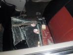 kerusakan-yang-ditimbulkan-akibat-aksi-kejahatan-pecah-kaca-mobil-yang-terjadi-saat-rombongan-pkb_20180718_074530.jpg