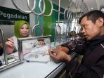 kesibukan-pegadaian-menjelang-ramadan_20180516_011328.jpg