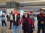 ketua-pb-persani-ita-yuliati-iriawan-saat-tiba-di-bandara-soekarno-hatta.jpg