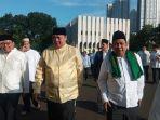ketua-umum-partai-golkar-airlangga-hartarto-dan-acaleg-terpilih-dpr-ri-partai-golkar-eric-hermawan.jpg