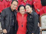 ketua-umum-pdip-megawati-soekarnoputri-dirangkul-kedua-anaknya-puan-maharani-prananda-prabowo.jpg