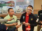 ketua-umum-pssi-mochamad-iriawan-dan-menpora-zainudin-amali.jpg