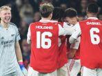 kieran-tierney-selebrasi.jpg