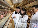 kim-jong-un-dan-putrinya-ju-ae-mengunjungi-pabrik-ayam-kwangchon-mingg-712024.jpg