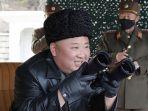 kim-jong-un-menonton-latihan-oleh-sub-unit-artileri-jarak-jauh-militer.jpg