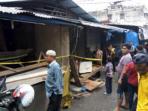kios-baju-milik-murni-dibakar_20161025_105634.jpg
