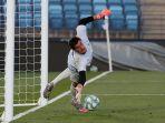 kiper-andalan-real-madrid-thibaut-courtois-dalam-sesi-latihan-tim.jpg
