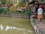 kolam-ikan-lokasi-calon-pengantin-tenggelam-di-jalan-rawa-sari-rt-47-rw-16-keluruhan-bukit-sangkal.jpg