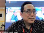 komisioner-kpu-i-dewa-kade-wiarsa-raka-sandi.jpg