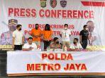 konferensi-pers-polda-metro-jaya-terkait-kasus-penipuan-bermodus-love-scamming.jpg