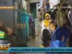 korban-banjir-sungai-citarum-mulai-bersihkan-rumah_20161118_175520.jpg
