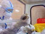 korban-virus-corona-mencapai-2112-jiwa-meninggal-dunia_20200221_010139.jpg