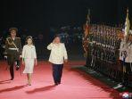 korea-utara-kim-jong-un-ri-sol-ju-parade-militer-akbar.jpg