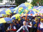 kota-malang-pecahkan-rekor-muri-senam-sambil-pakai-payung-di-jalan-sehat-sadar-pajak-2018.jpg