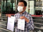 kurnia-ramadhana-laporkan-firli-bawa-bukti.jpg