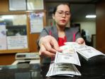 kurs-rupiah-melemah_20180301_194310.jpg