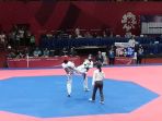laga-antara-taekwondoin-putri-indonesia-fitriana-yusuf-shaleha_20180820_125709.jpg