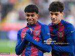 lamine-yamal-dari-fc-barcelona-dan-rekan-setimnya-hector-fort.jpg