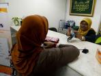 layanan-perbankan-di-bank-danamon-syariah_20160701_162001.jpg