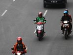 layanan-transportasi-berbasis-aplikasi-akhirnya-tetap-beroprasi_20151218_181309.jpg