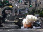 ledakan-menerpa-kendaraan-militer-Israel-di-Tepi-Barat.jpg<pf>Kendaraan-militer-pasukan-Israel-IDF-dalam-operasi-penyerbuan-besar-besaran-di-Kota-Jenin.jpg