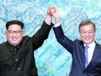 li-jong-un-dan-moon-jae-in_20180502_113355.jpg
