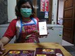 lia-45-saat-menunjukkan-layanan-gobiz-membantu-dirinya.jpg