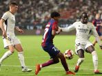 libas-barcelona-real-madrid-juara-piala-super-spanyol_20240115_131649.jpg
