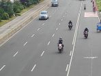 liburan-cuti-bersama-jalan-sudirman-jakarta-lengang_20200821_165359.jpg