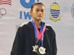 lifter-putri-nur-vinatasari-15-raih-tiga-pedali-perak-di-kejuaraan-dunia-angkat-besi-remaja_20161022_162912.jpg