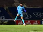 liga-1-arema-fc-petik-kemenangan-2-1-atas-barito-putera_20211201_203616.jpg