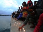 lilin-untuk-korban-km-sinar-bangun_20180624_203410.jpg