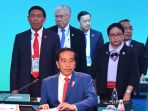 lima-menteri-berdiri-di-belakang-presiden-indonesia-joko-widodo_20180318_170822.jpg