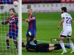 lionel-messi-dan-martin-braithwaite.jpg