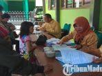 loket-penerimaan-peserta-didik-baru-ppdb-sistem-zonasi-di-smpn-3-tulungagung.jpg