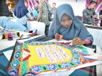 lomba-kaligrafi-meriahkan-pekan-ekonomi-syariah-2018_20180916_195107.jpg