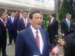 luhut-panjaitan-bisiki-presiden-jokowi-kalau-orang-sumut-sangar-sangar_20171126_113518.jpg