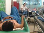 luka-juari-berhasil-keluar-lewat-jendela-bus-sang-engon_20150220_191954.jpg