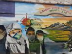 lukisan-mural-covid-19-di-tembok-pembatas-kampung_20201223_104119.jpg
