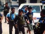 m-sofyan-sandera-abu-sayyaf-asal-takalar-di-kantor-polisi-filipina_20160819_110931.jpg