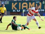 madura-united-melaju-ke-babak-semi-final-piala-indonesia_20190627_205424.jpg
