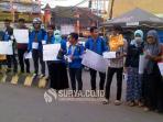 mahasiswa-di-malang-kumpulkan-koin-untuk-australia_20150223_144140.jpg