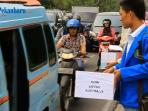 mahasiswa-galang-aksi-pengumpulan-koin-untuk-australia_20150225_174831.jpg