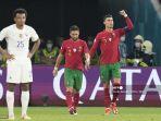 main-depan-portugal-cristiano-ronaldo-kanan-merayakan-setelah-mencetak-tendangan-penalti-kedua.jpg